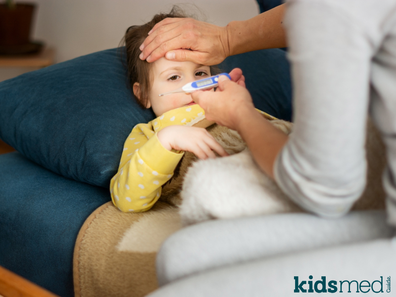 Sick child with fever resting